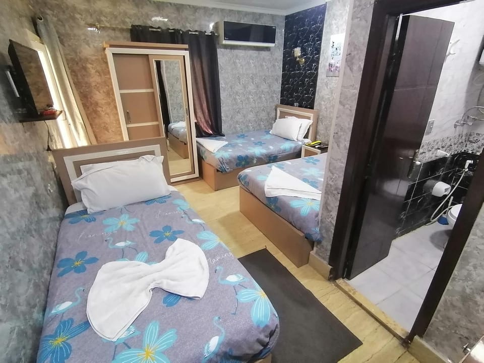 Bed, Photo of the whole room, towels, air conditioner