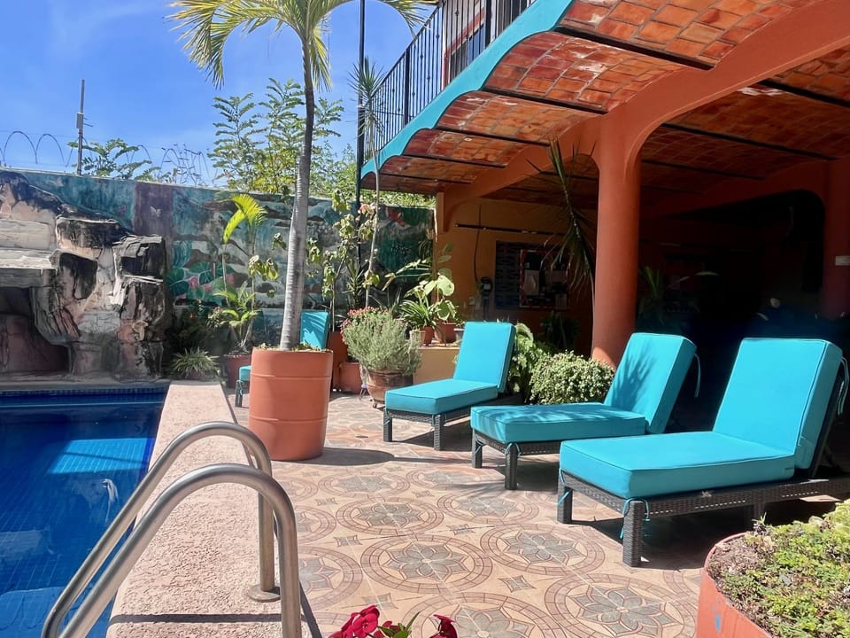 Property building, Patio, Day, Pool view, Swimming pool, sunbed