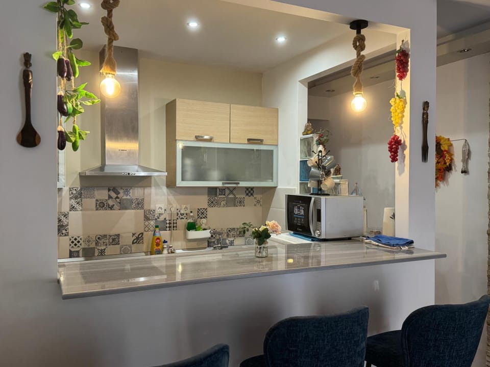 Kitchen or kitchenette, oven, stove