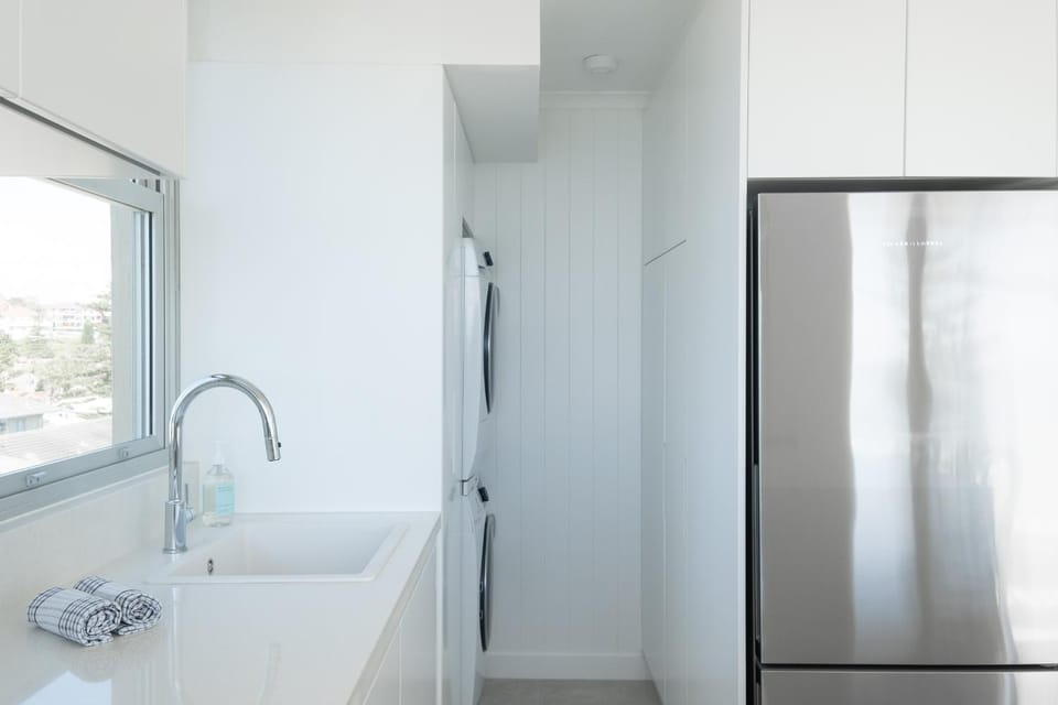 dishwasher, microwave, oven, stove, laundry, washing machine, dryer, kitchen