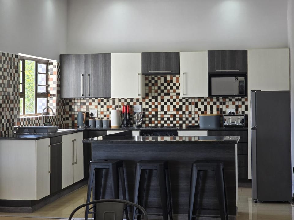 Kitchen or kitchenette, oven