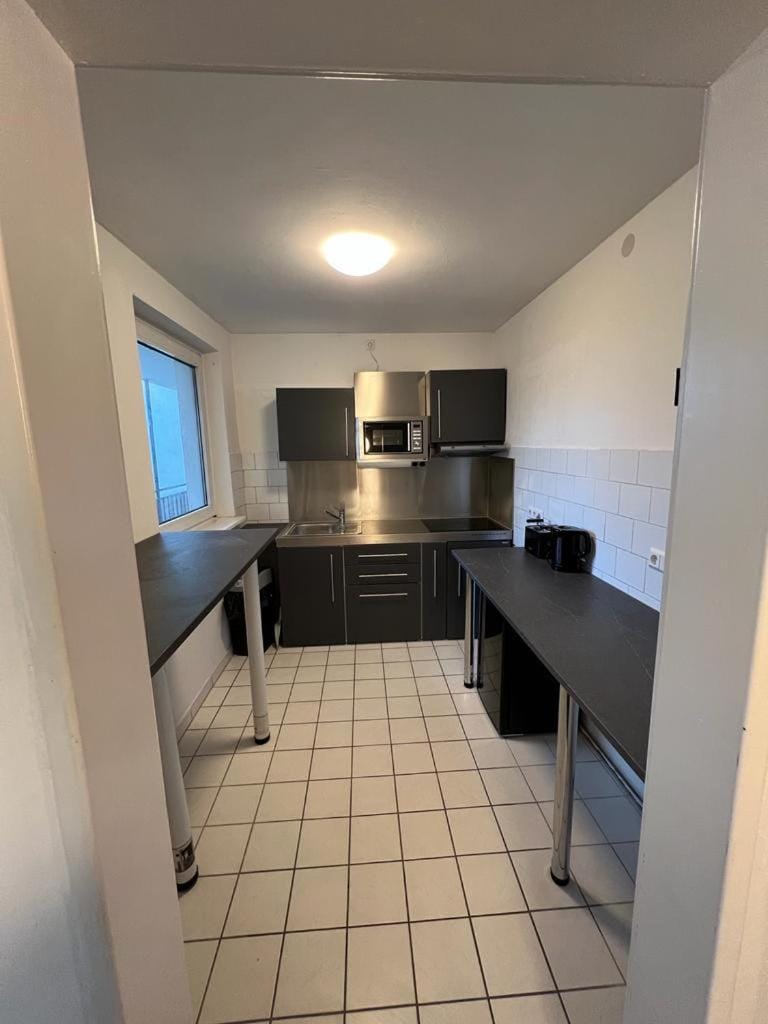 Kitchen or kitchenette, oven, stove