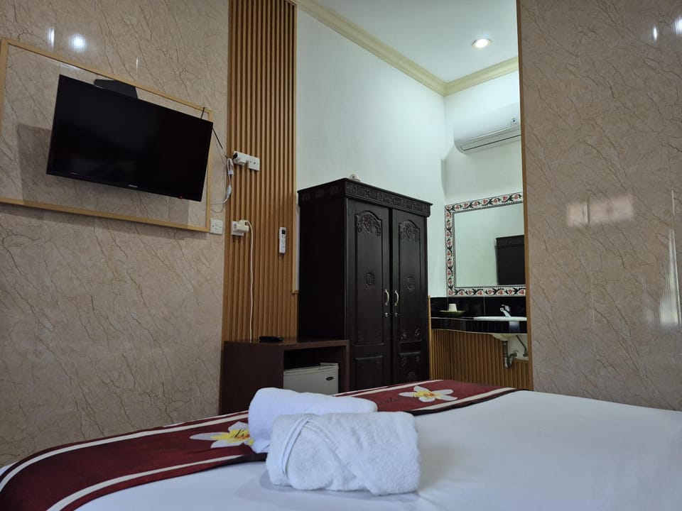 Frangipani Homestay Bed and Breakfast in Kuta Selatan