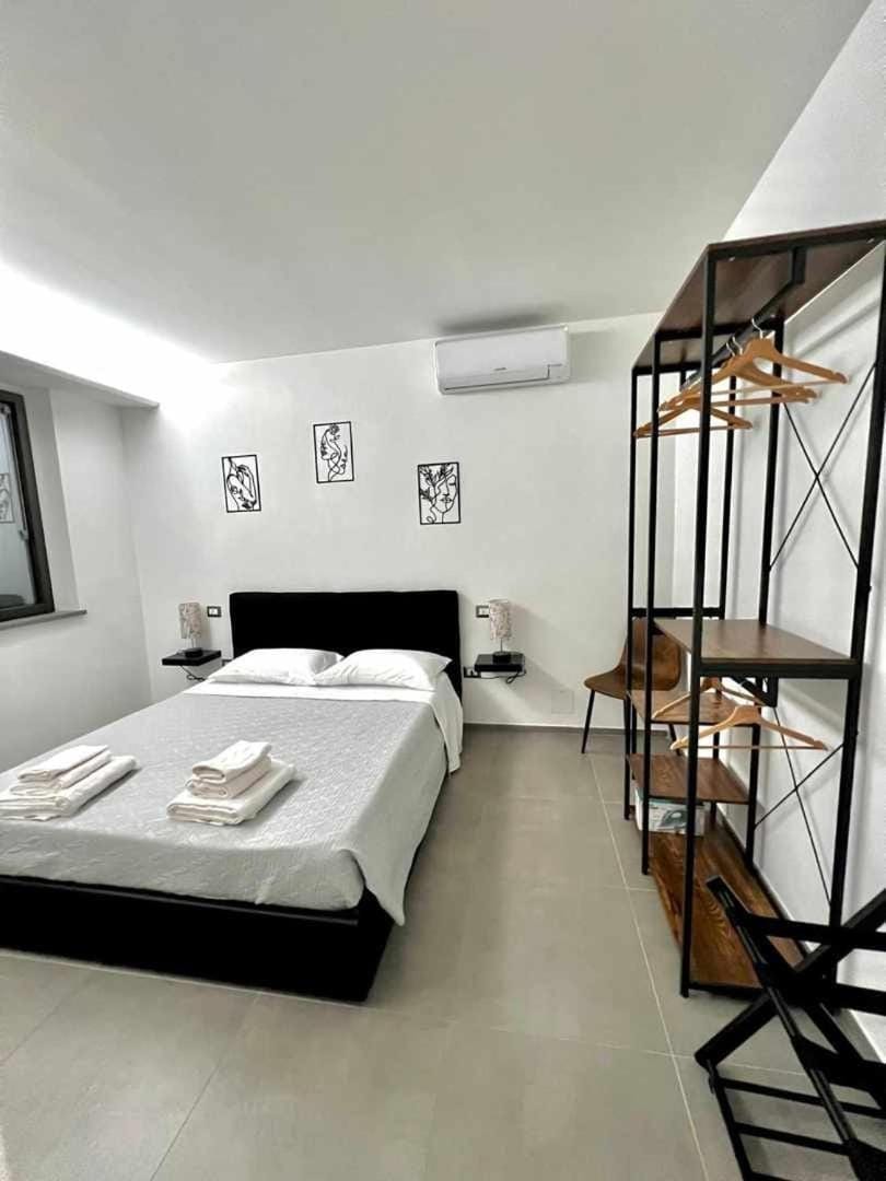 Bed, Photo of the whole room, Bedroom, towels, air conditioner