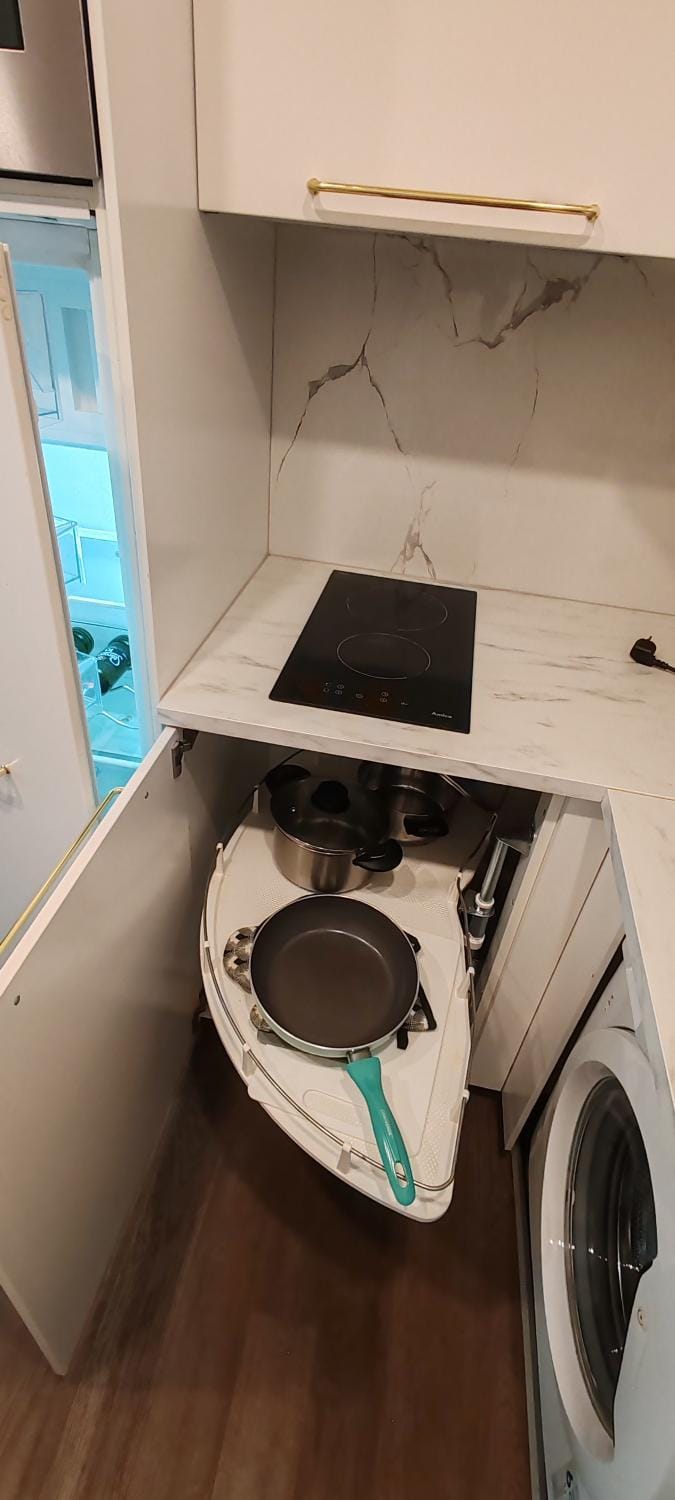 Kitchen or kitchenette, washing machine