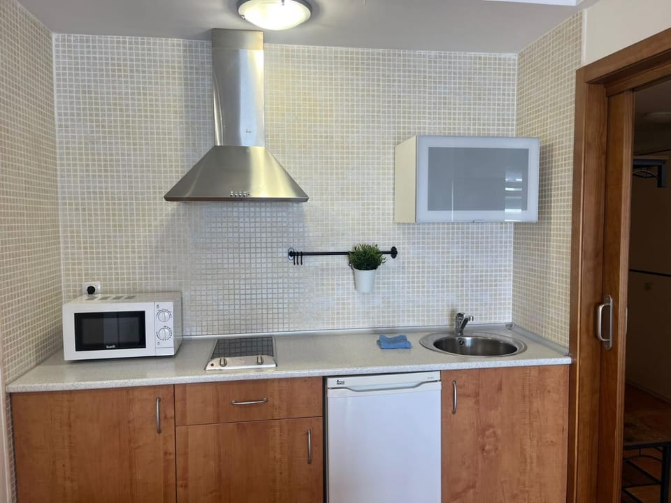Kitchen or kitchenette, stove