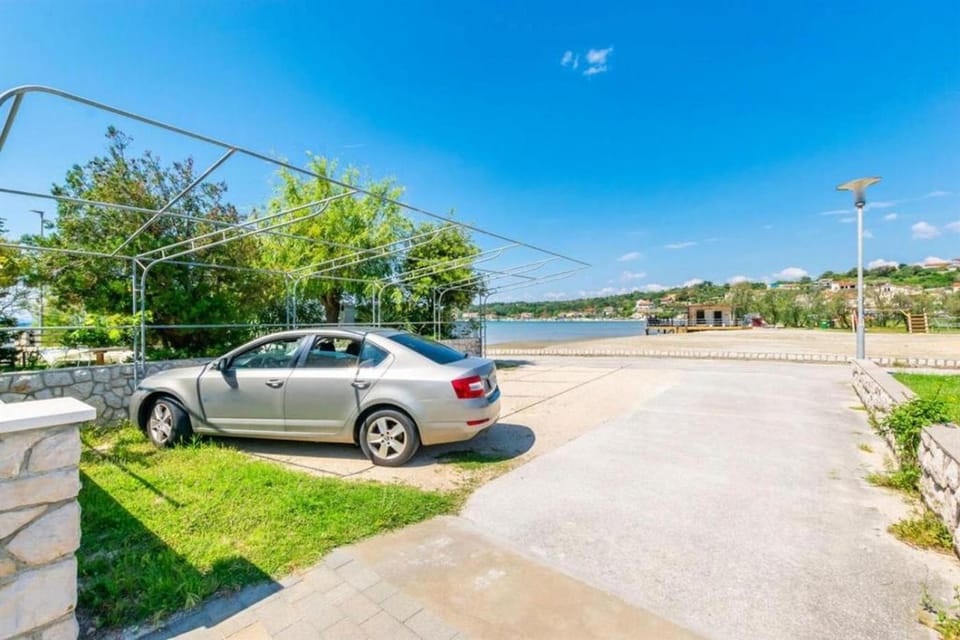 Apartment in Lopar with sea view, balcony, air conditioning, Wi-Fi 4419-4 Apartment in Lopar