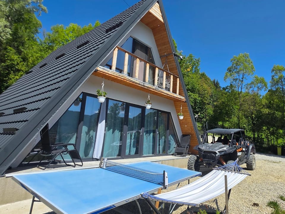 Property building, Patio, Day, Natural landscape, Dining area