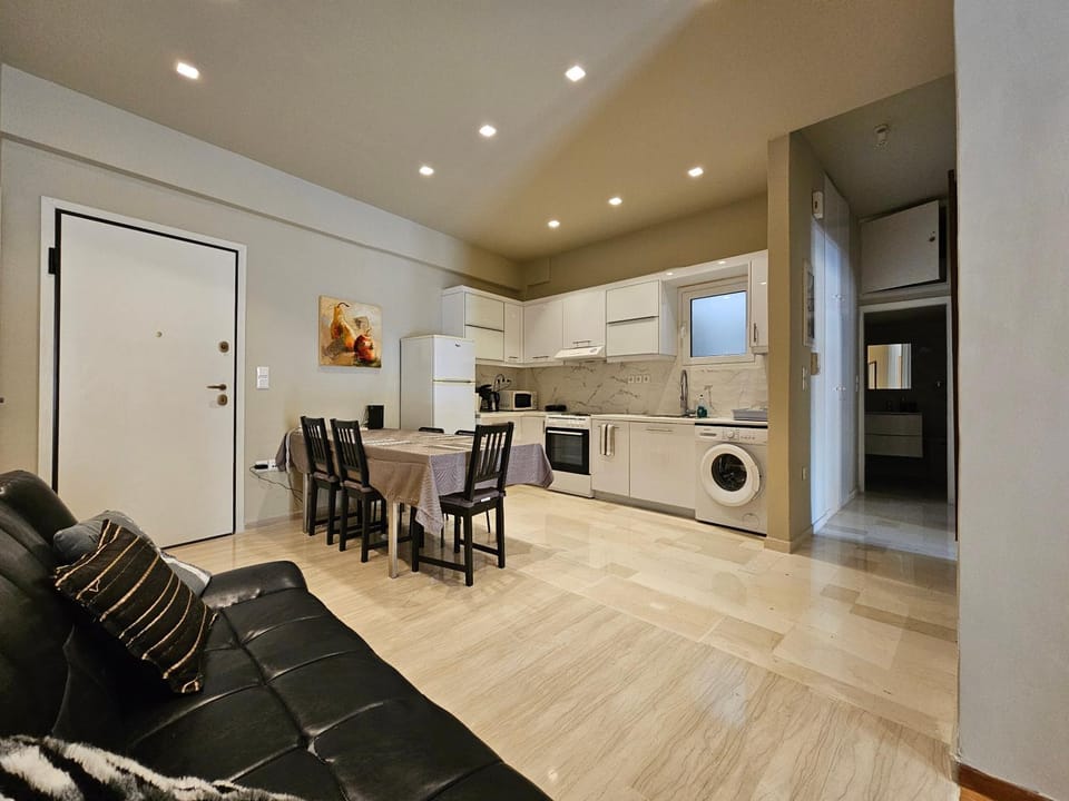 Kitchen or kitchenette, Living room, Seating area, oven, stove, washing machine