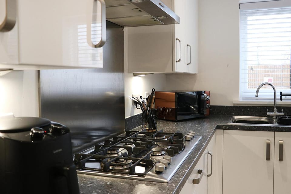 oven, storage, stove, stove, laundry, laundry, kitchen, kitchen