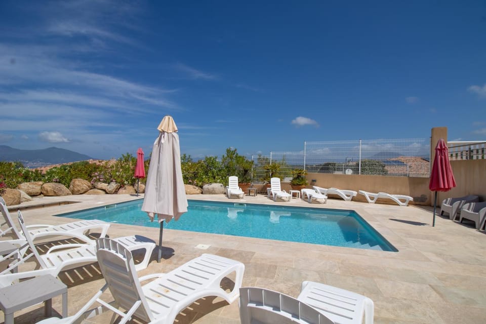 Property building, Living room, Swimming pool