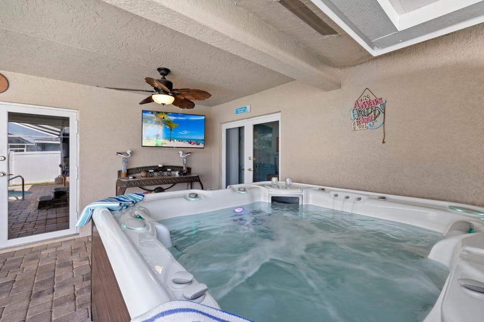 Fully stocked! Bikes, pool table, hot tub... everything you need! Villa Aleena - SWFL Rentals Villa in Cape Coral