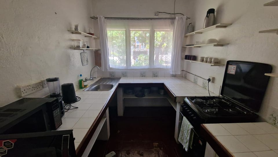 Kitchen or kitchenette, oven, stove, toaster
