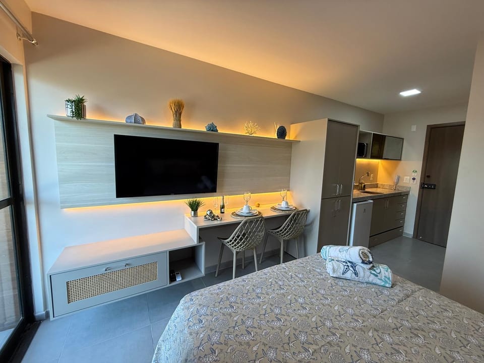 Bed, TV and multimedia, Living room, Seating area