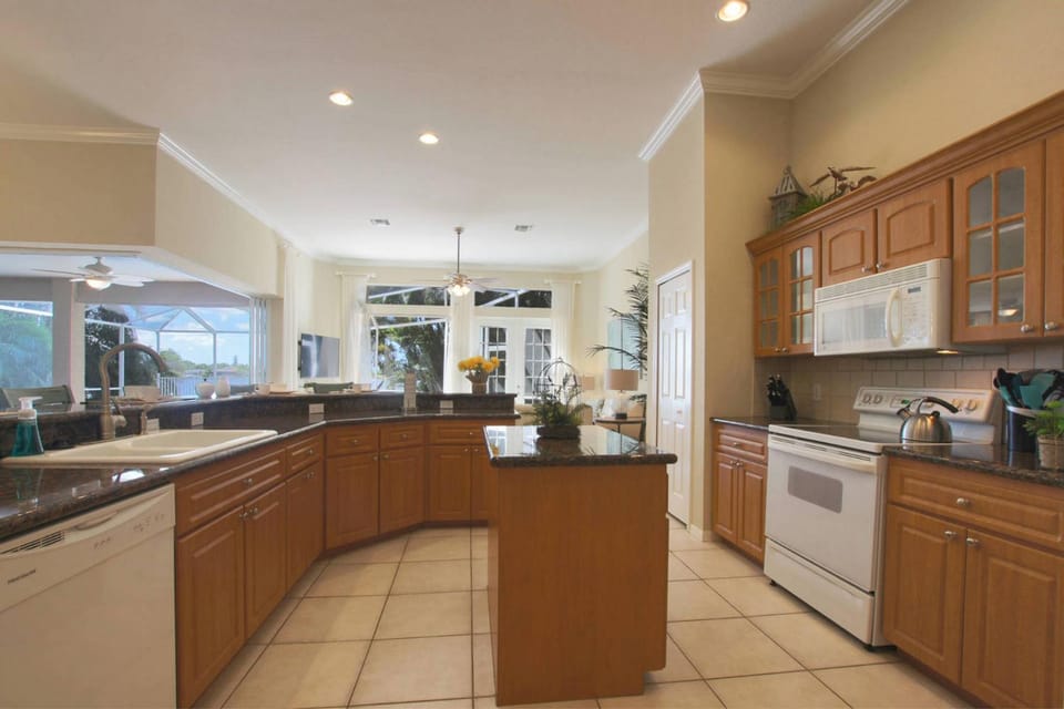 Lakefront Gulf Access villa w/heated pool & spa; Sleeps 9! Villa Madison - SWFL Rentals Villa in Cape Coral