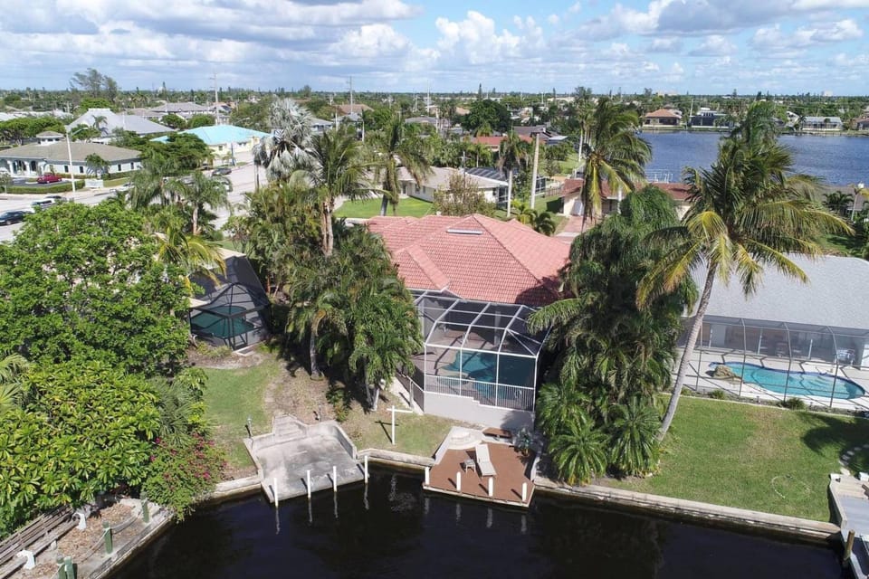 Lakefront Gulf Access villa w/heated pool & spa; Sleeps 9! Villa Madison - SWFL Rentals Villa in Cape Coral