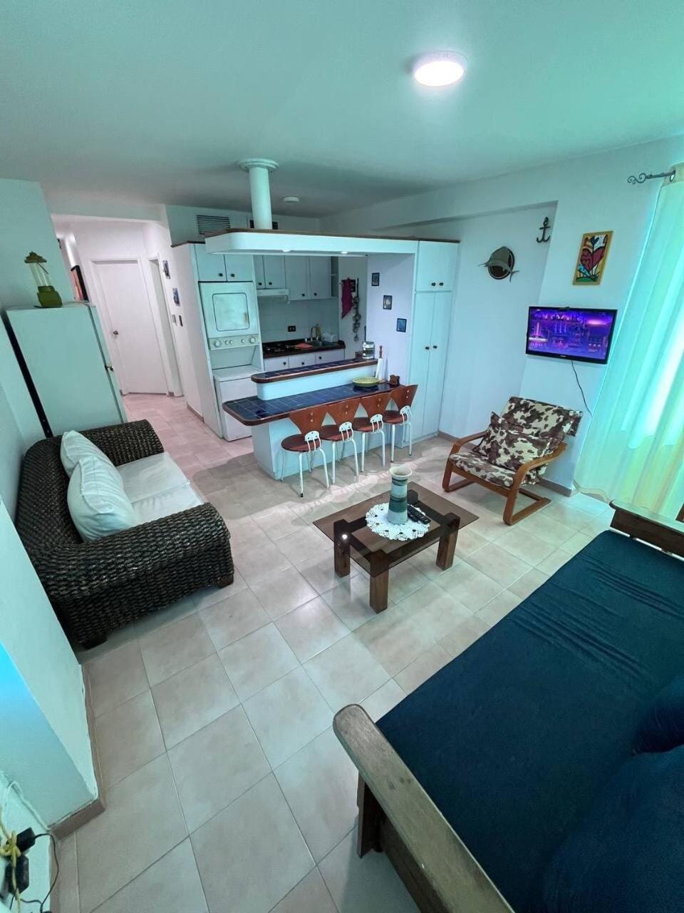 TV and multimedia, Kitchen or kitchenette, Living room, Photo of the whole room, Seating area, washing machine, dryer