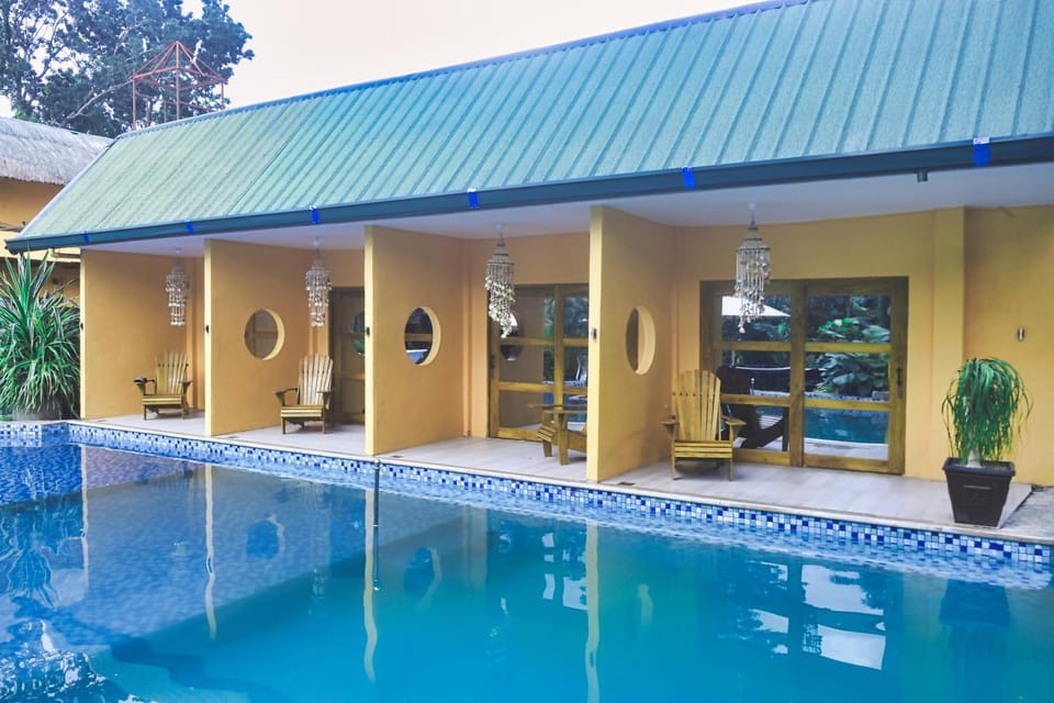Property building, Day, Pool view, Swimming pool, sunbed