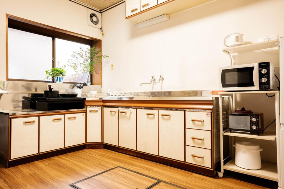 Kitchen or kitchenette, microwave, toaster