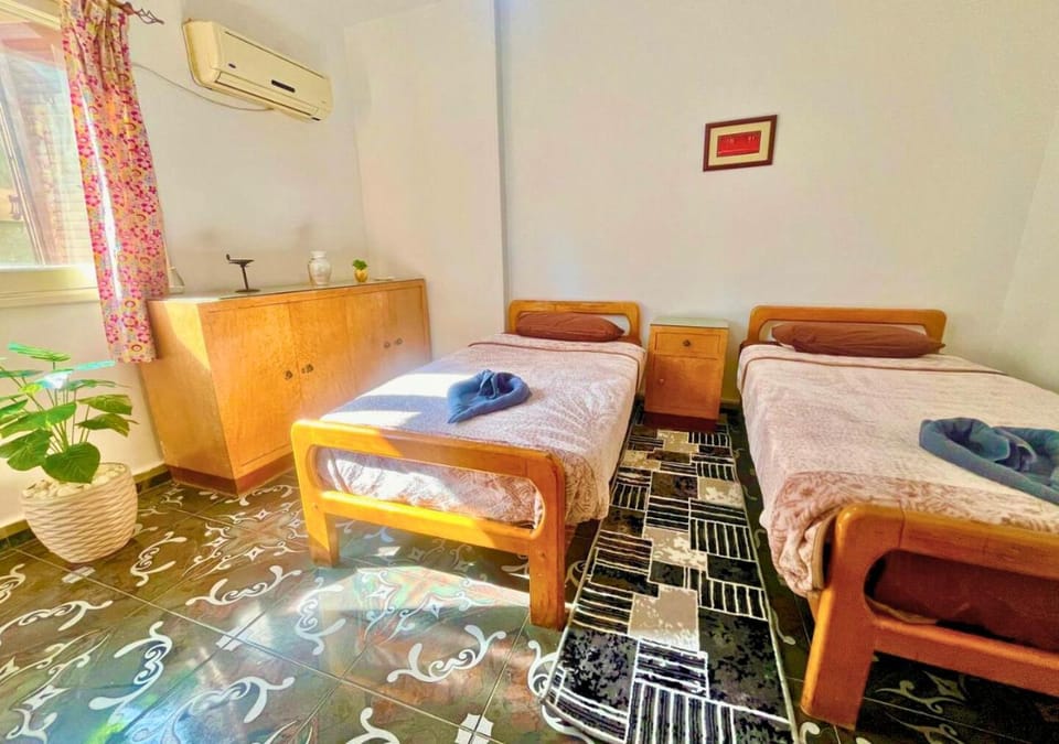 Bed, Photo of the whole room, Bedroom, towels, air conditioner