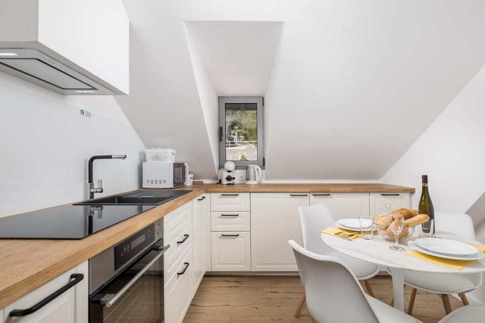 Seating area, microwave, oven, stove, kitchen