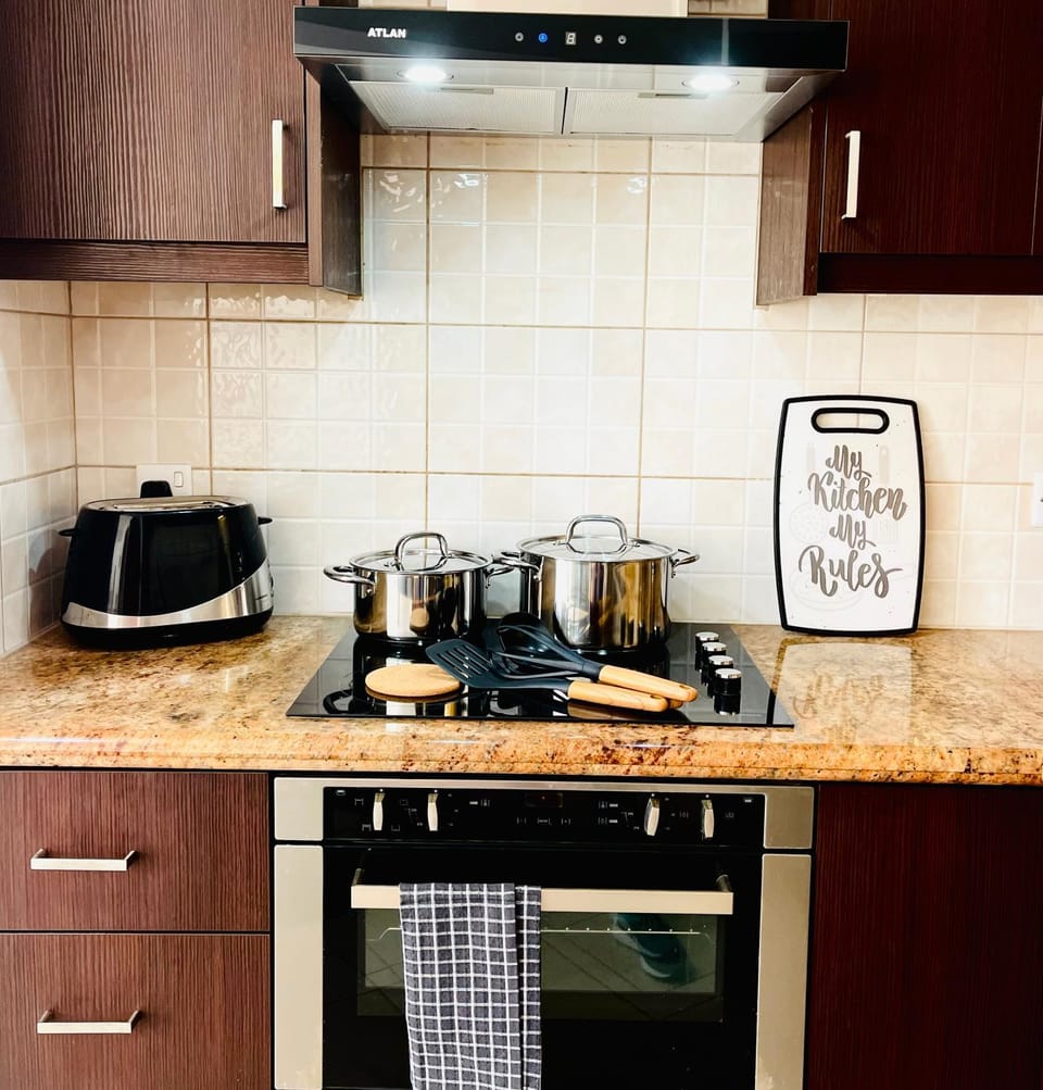 Kitchen or kitchenette, stove, toaster