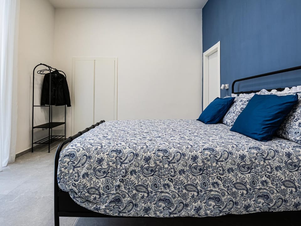 Bed, View (from property/room), Decorative detail, Decorative detail, Bedroom, City view, furniture, furniture, wardrobe, air conditioner