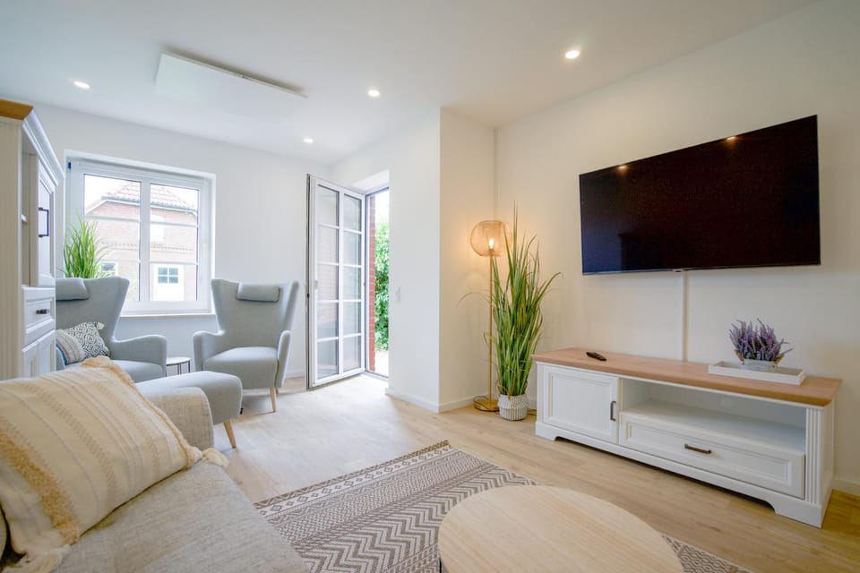 Sonnenterrasse - Helle & moderne Ferienwohnung am Meer Apartment in Nordstrand