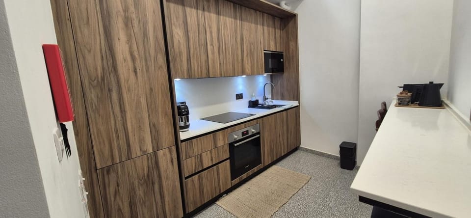 Kitchen or kitchenette, oven, stove