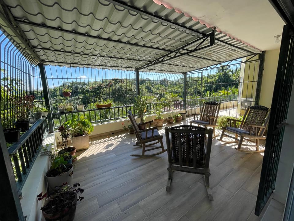 View (from property/room), Balcony/Terrace, Seating area, Garden view