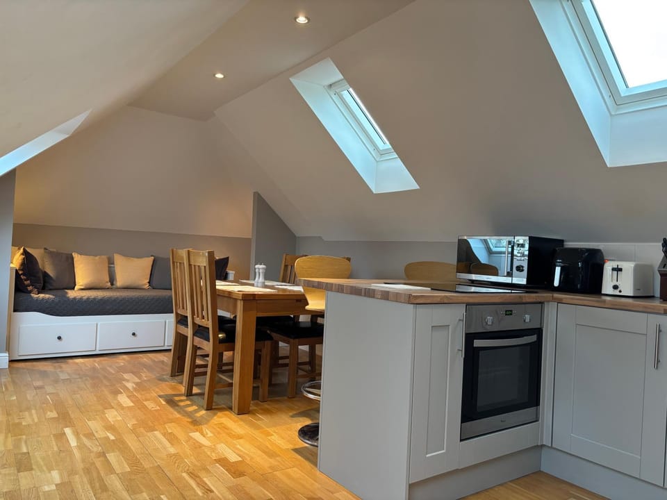 Kitchen or kitchenette, oven, stove, toaster
