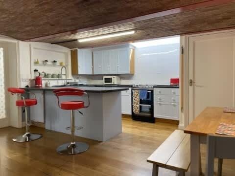 Kitchen or kitchenette, Dining area, dishwasher, oven, stove, toaster