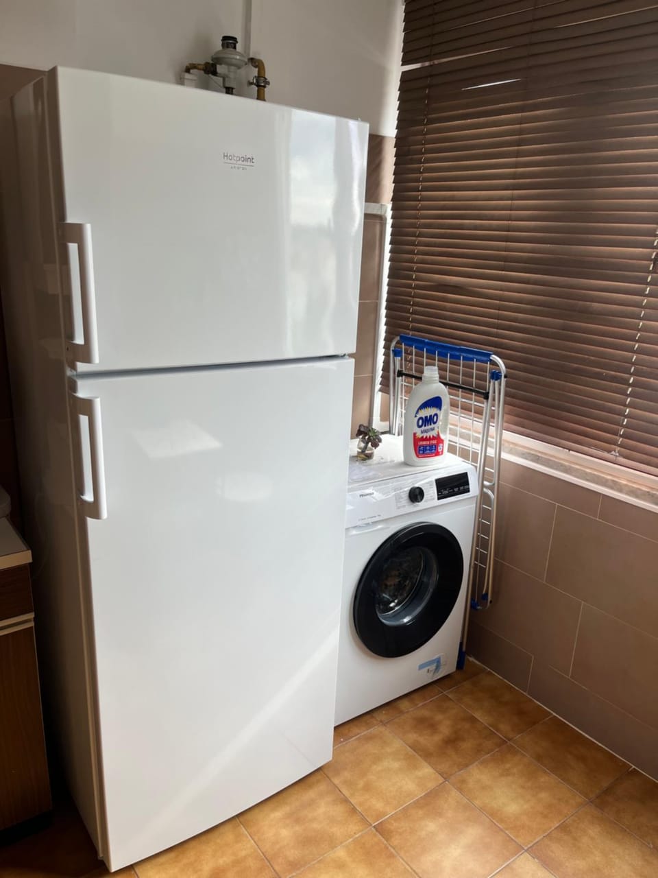 Kitchen or kitchenette, washing machine