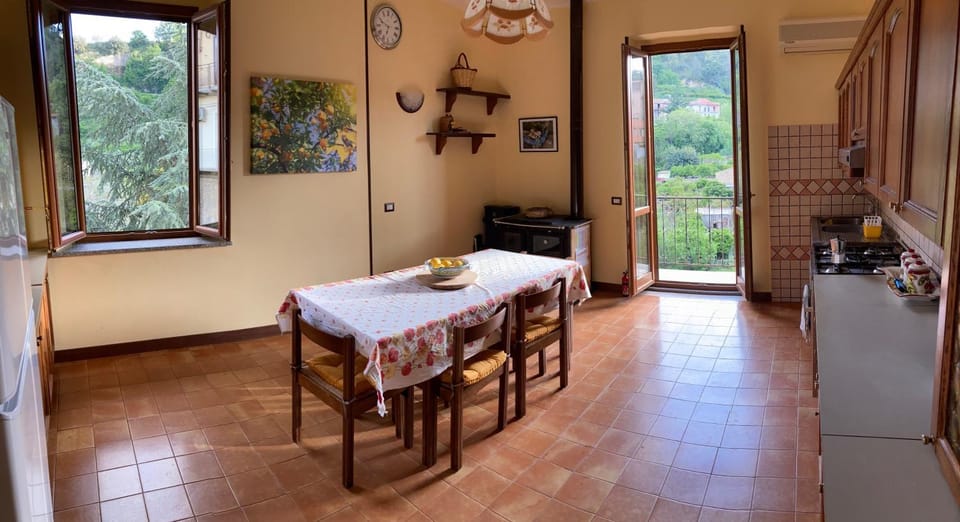 Dining area, flat iron, oven, stove, kitchen, air conditioner