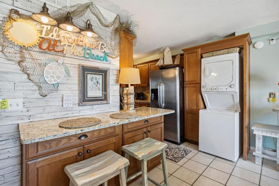 Kitchen or kitchenette, dishwasher, minibar, oven, stove, washing machine, dryer