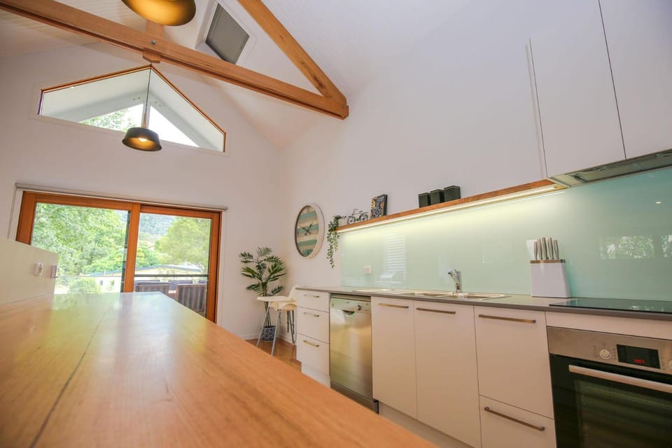 Kitchen or kitchenette, dishwasher, microwave, oven, stove, toaster