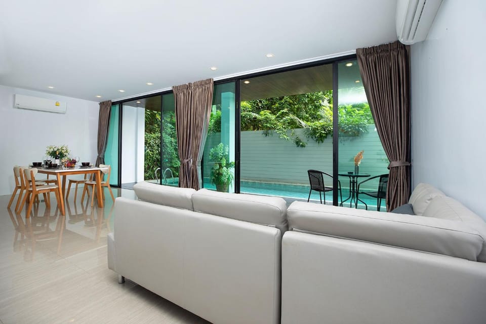 Property building, Living room, Seating area, Dining area, Pool view, Swimming pool, air conditioner