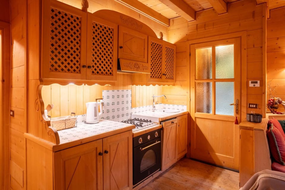 Kitchen or kitchenette, dishwasher, oven, stove