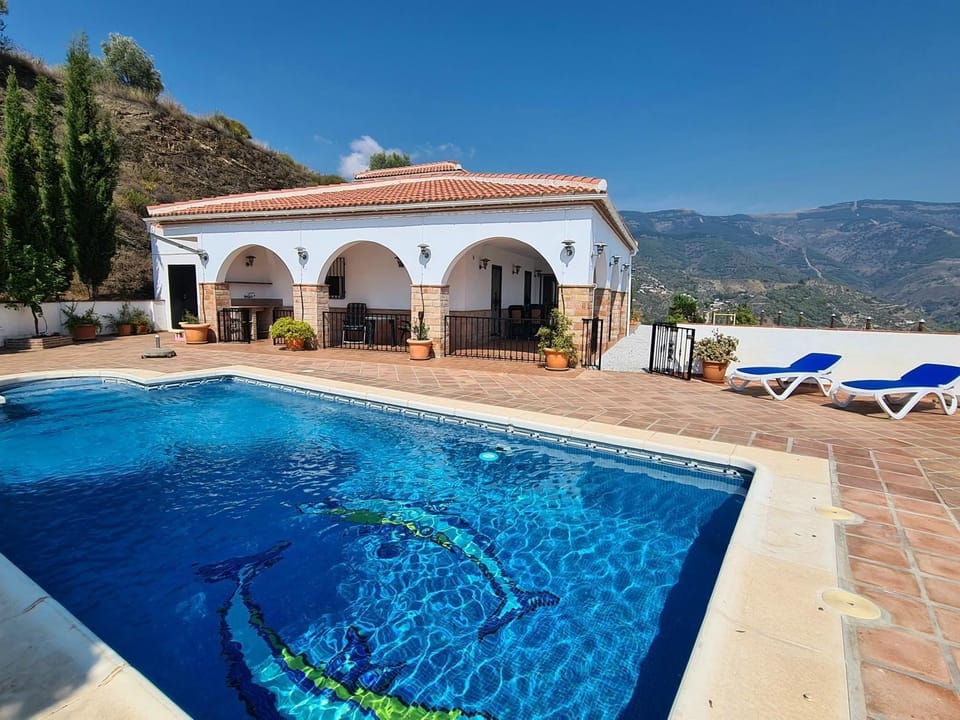 Property building, Living room, Swimming pool