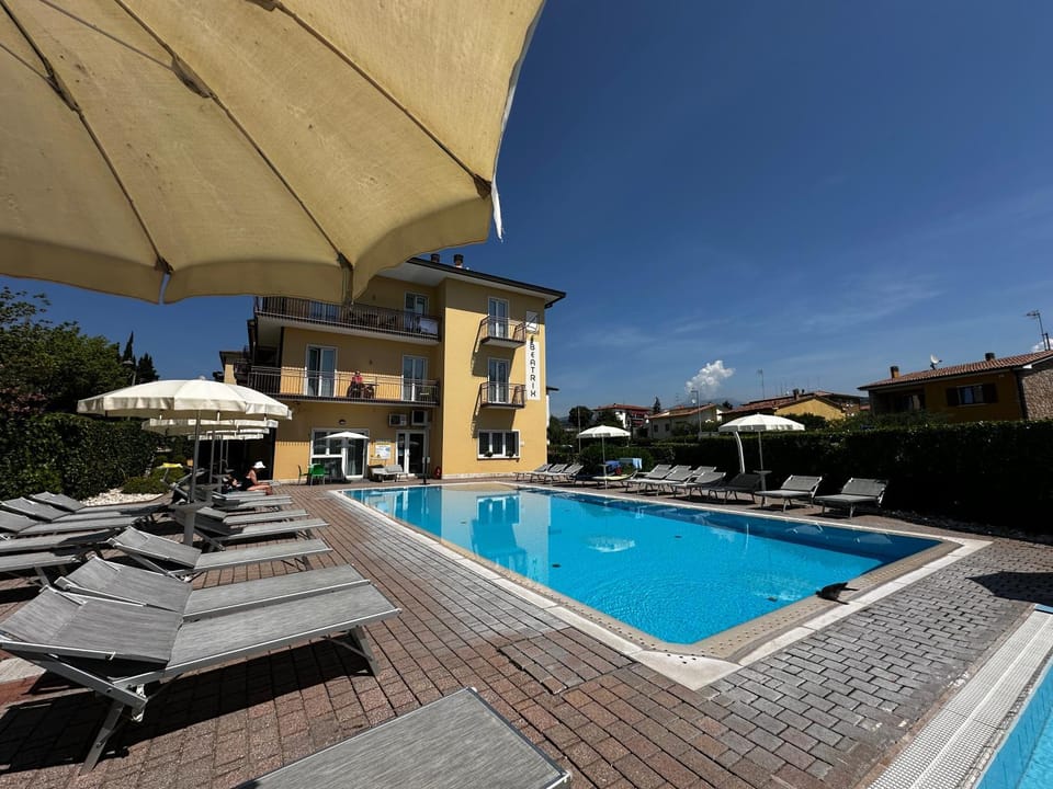 Swimming pool, sunbed