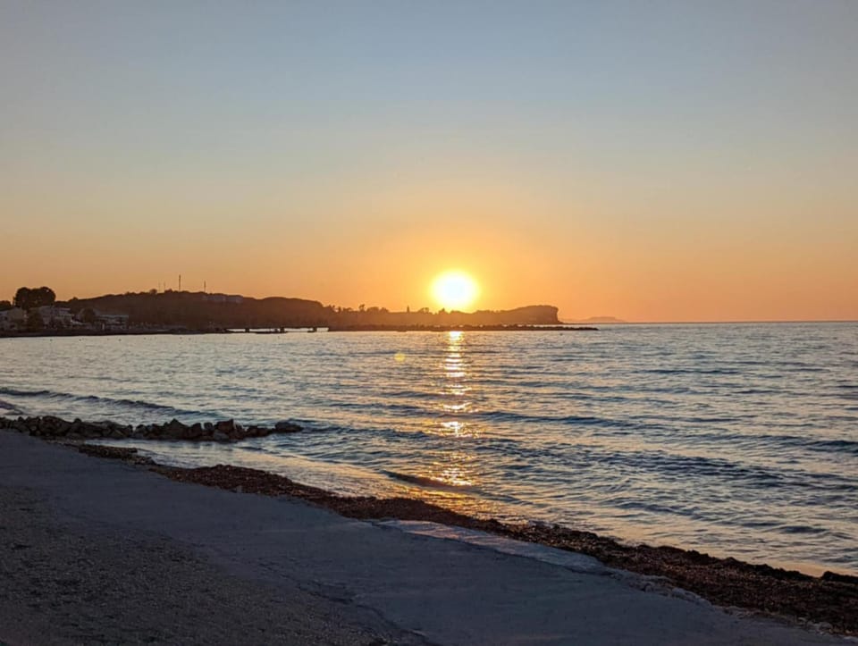 Nearby landmark, Natural landscape, Beach, Sunset