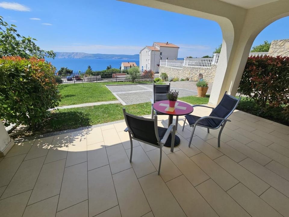 Patio, Balcony/Terrace, Seating area, Garden view, Sea view