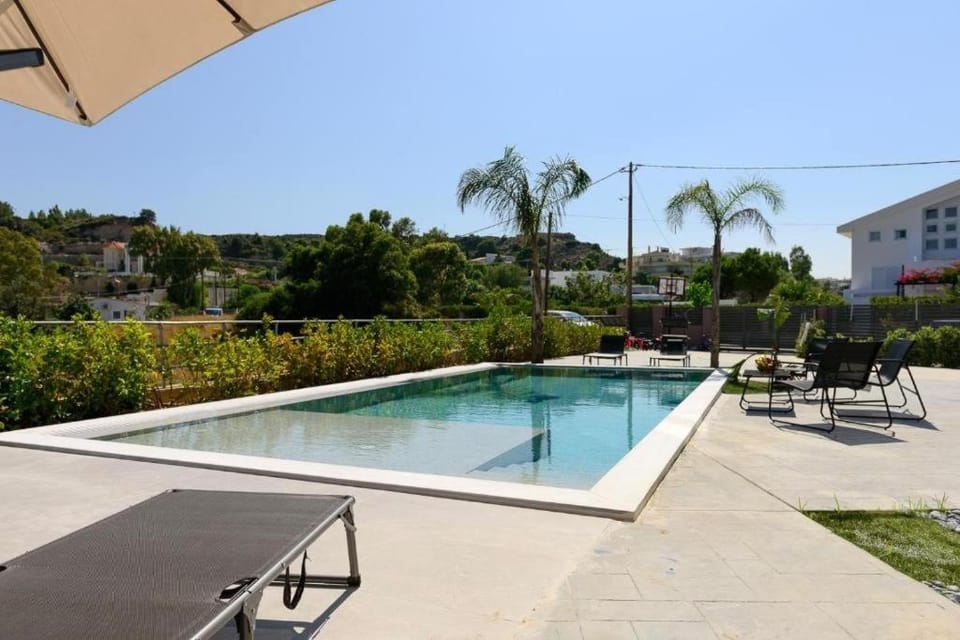 Patio, Day, Pool view, Swimming pool, sunbed