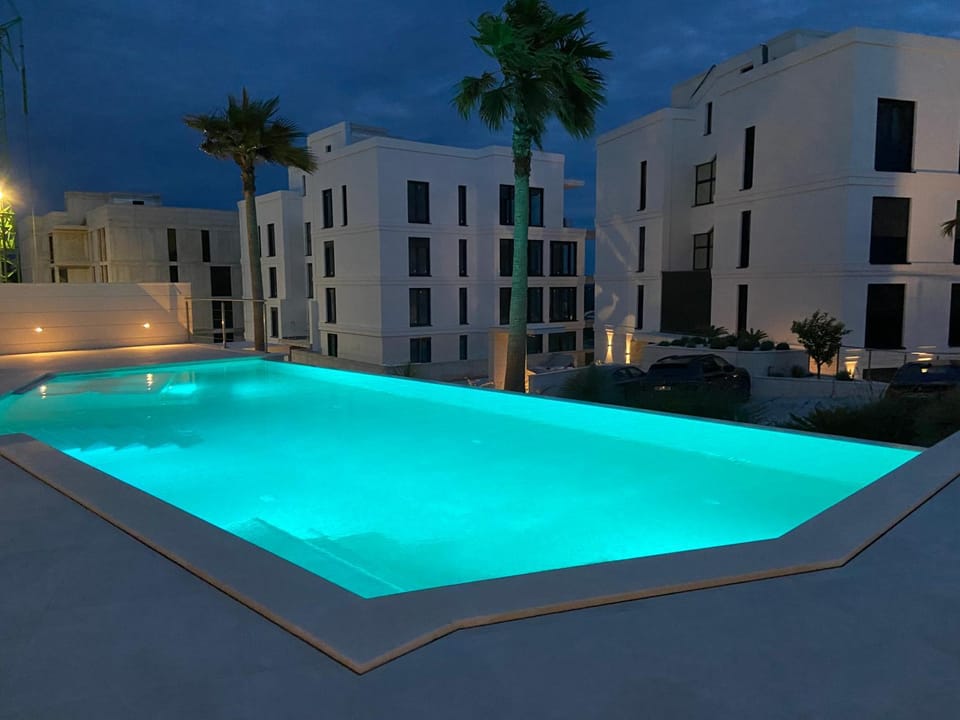 Property building, Night, Pool view, Swimming pool, Swimming pool