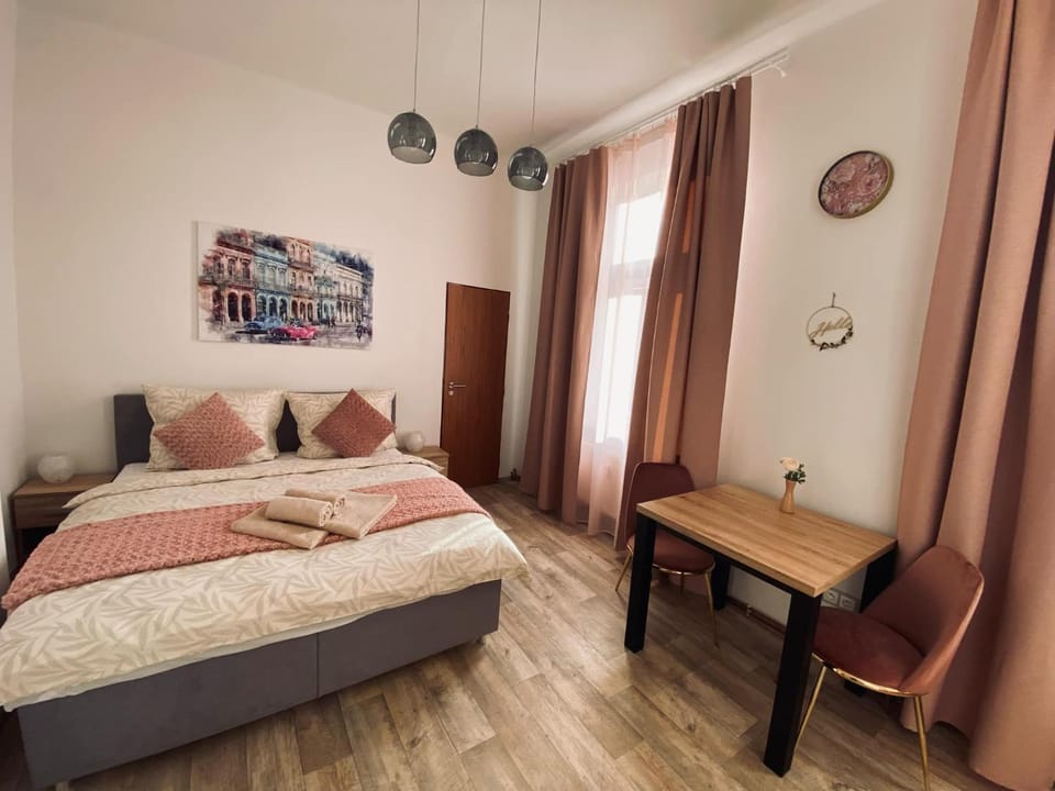 Bed, Living room, Seating area, Bedroom
