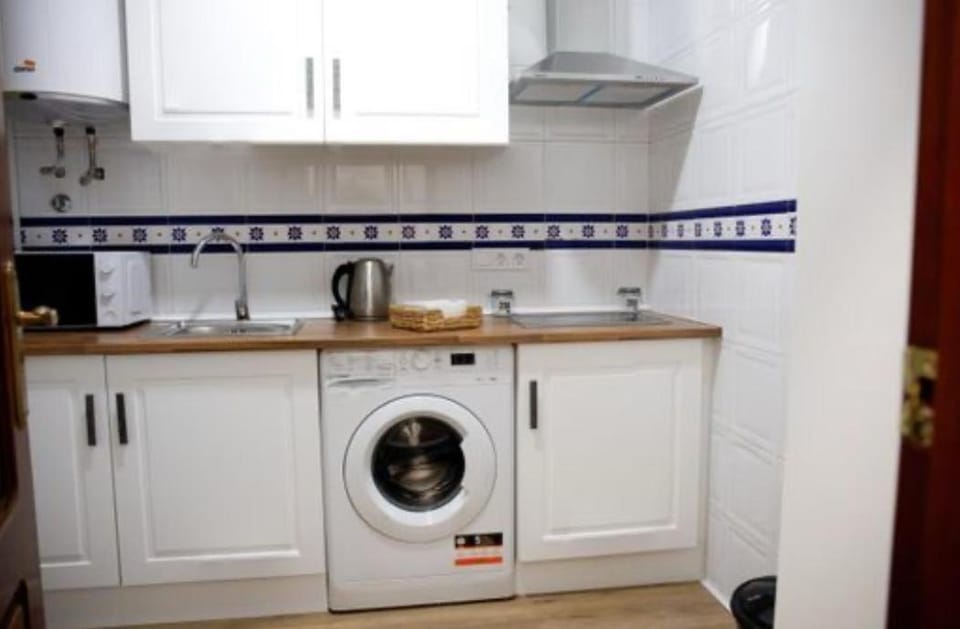 Kitchen or kitchenette, washing machine
