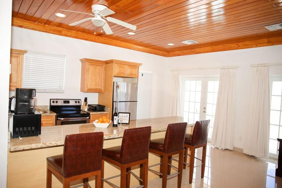 Tangerine Sunsets Satsuma One House in Nassau