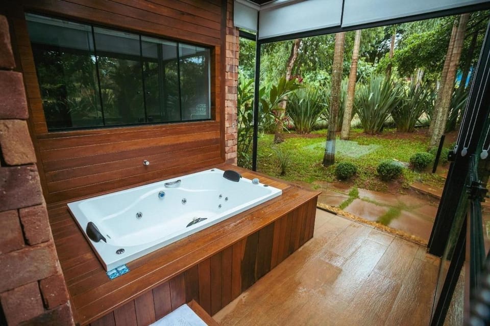 Loft Igarapé conforto integrado coma natureza Apartment in State of São Paulo