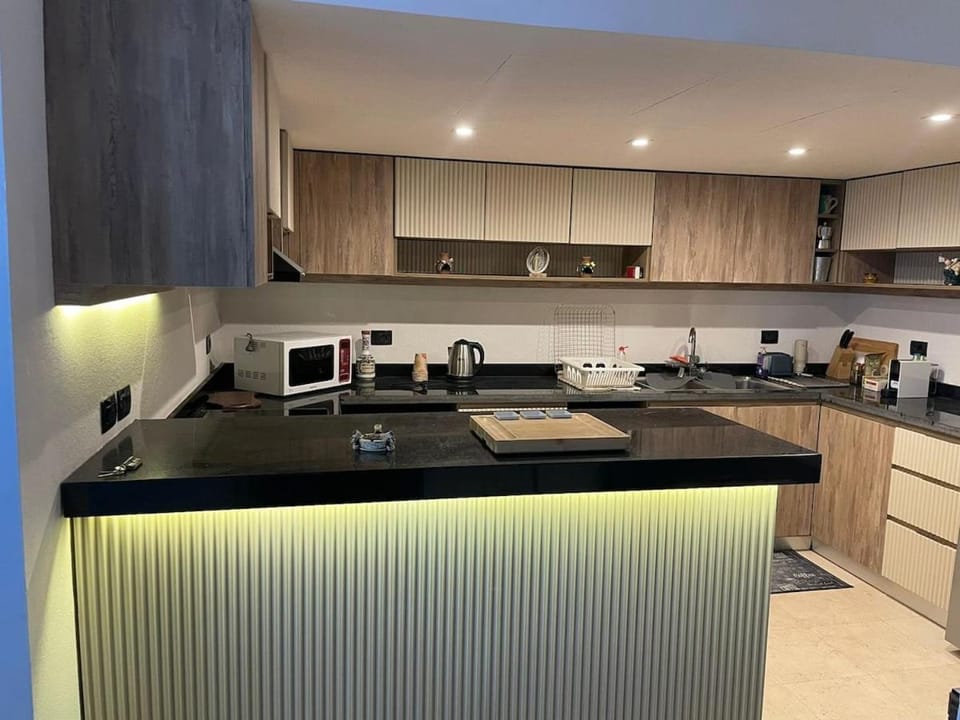 Kitchen or kitchenette, oven, stove, toaster
