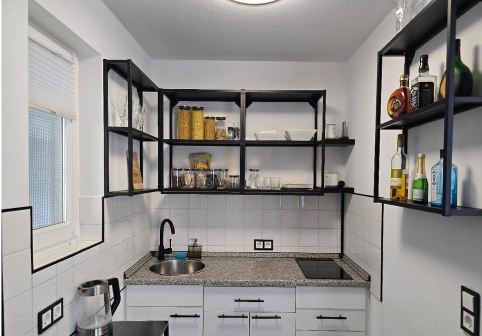 Kitchen or kitchenette, stove